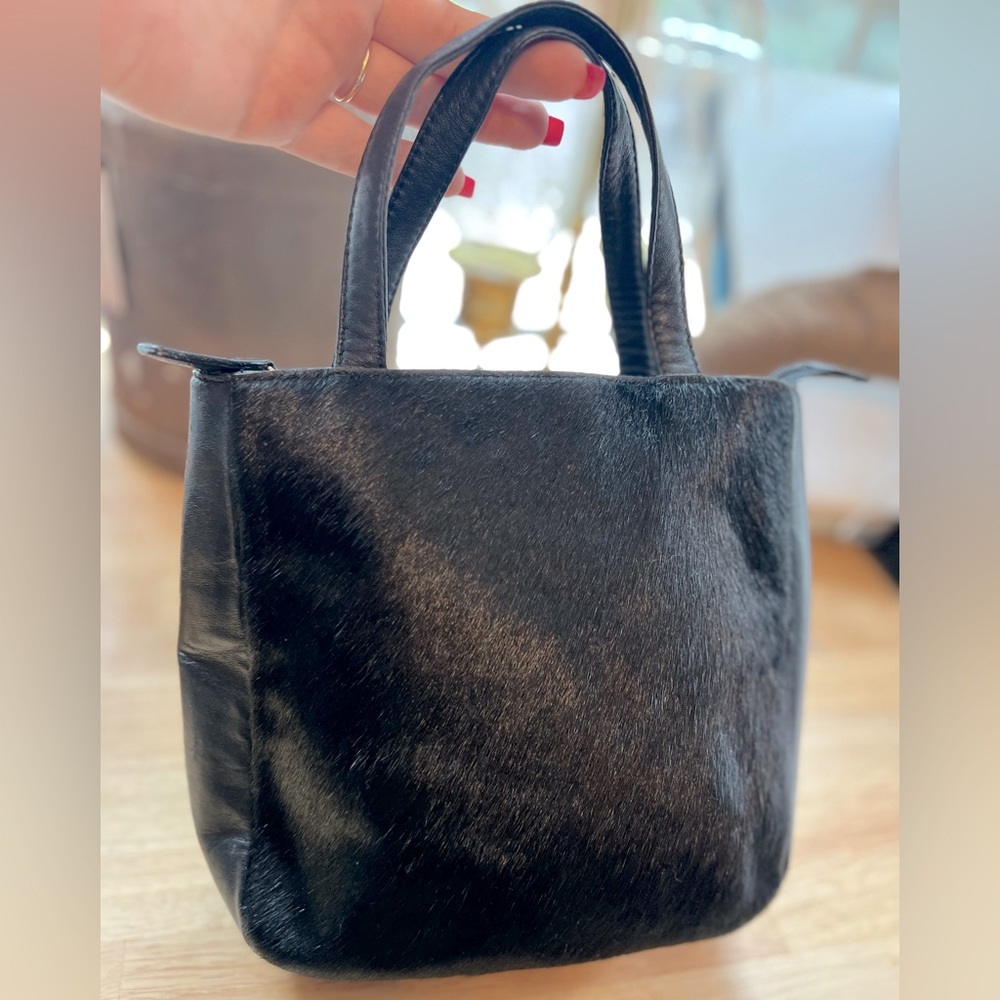 Vintage hair on cowhide leather ninewest handbag